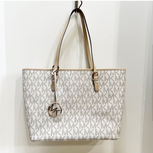 Michael Kors Jet Set Travel Leather Trim Tote Bag in Vanilla
NWT - Picture 3 of 13